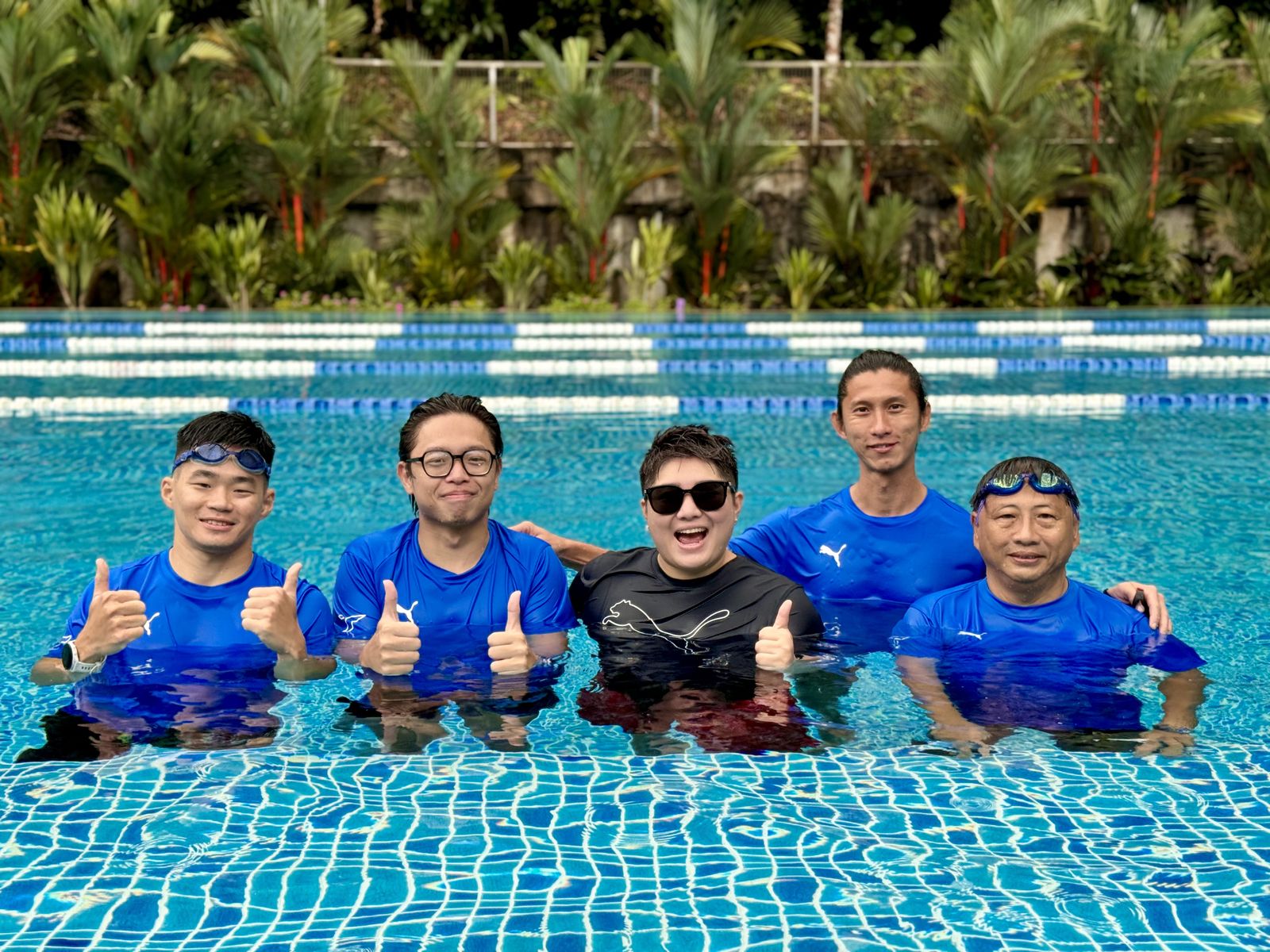 Tao Li Swimming Club coaches in the pool
